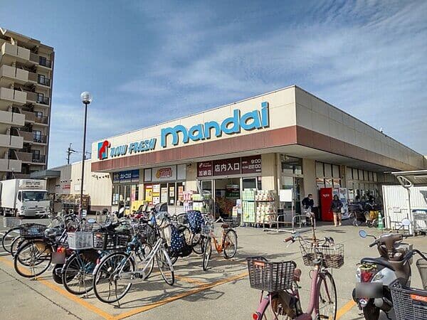 万代 加納店まで約350m